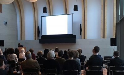 A lecture taking place in the Fitzhugh Auditorium