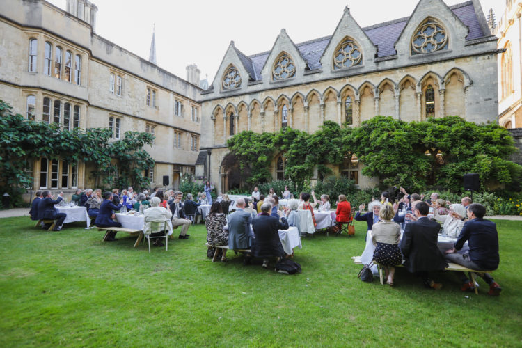 Guests enjoying the celebrations in the Fellows' Garden