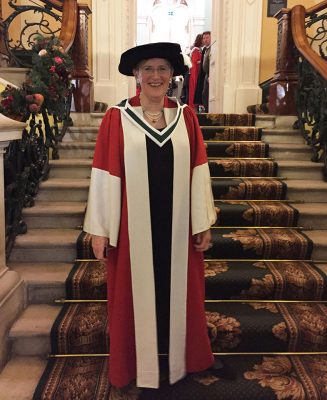 Helen Watanable O'Kelly receives honorary degree in DLitt robes at the Royal College of Physicians in Dublin