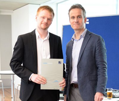 James Collins is presented with the 2016 Gibbs Prize by Professor Gideon Henderson