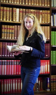 student reading in exeter college library