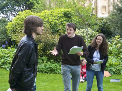 students rehearsing for The Importance of Being Earnest amateur production