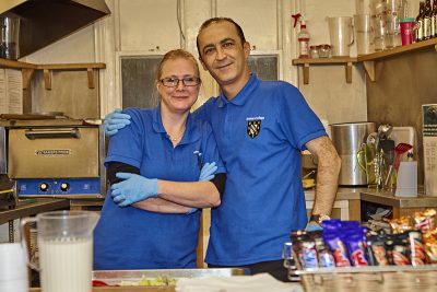 catering staff in the undercroft bar at lunch