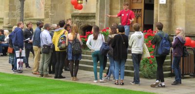 Exeter College Open Day - student showing prospective students and their families around the College