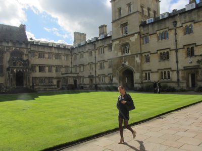 Student walking through Exeter College Front Quad