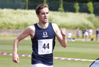 student running oxford blues athletics