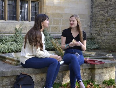 Students socialising in the Fellows' Garden, Exeter College