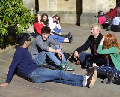 Students sitting in Exeter College Front Quad
