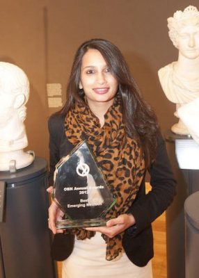 Michelle Fernandes receiving OBN award