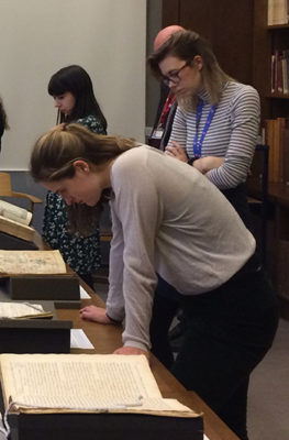 Medical students view rare medical books in the Bodleian's special collections