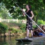 Exeter College Summer Programme Students Punting in river Cherwell
