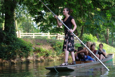 Exeter College Summer Programme Students Punting in river Cherwell