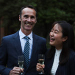 Exeter College Summer Programme Student smiling in Fellows Garden at a Formal