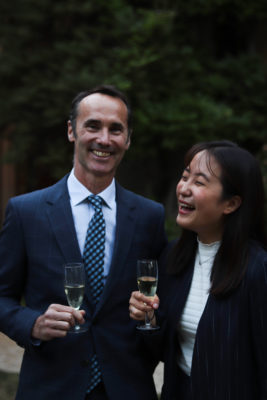 Exeter College Summer Programme Student smiling in Fellows Garden at a Formal