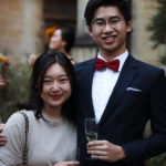 Exeter College Summer Programme Student smiling in Fellows Garden at a Formal