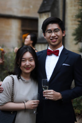 Exeter College Summer Programme Student smiling in Fellows Garden at a Formal