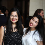 Exeter College students at a Formal smiling