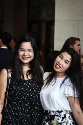 Exeter College students at a Formal smiling