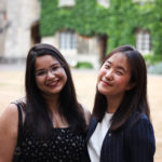 students smiling in Front Quad