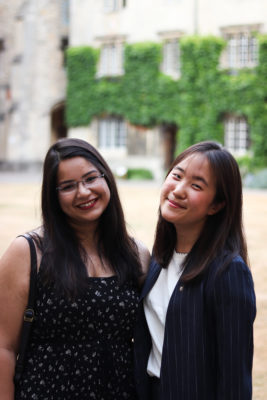 students smiling in Front Quad