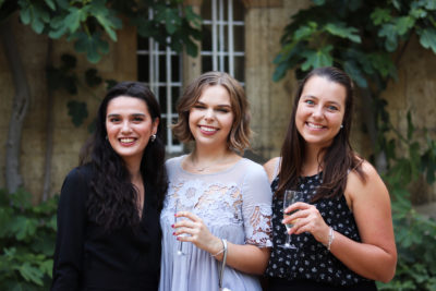 Exeter College Summer Programme Student smiling in Fellows Garden at a Formal