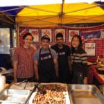 Exeter College Summer Programme Students at a food stall