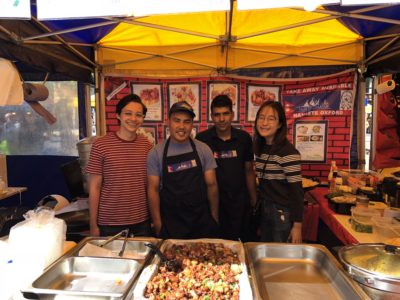 Exeter College Summer Programme Students at a food stall