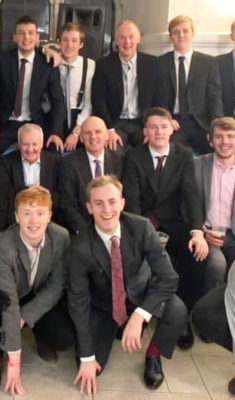 Exeter College football dinner guests pose before dinner on 25th January 2020