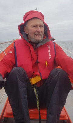 Richard Harries practices rowing on the open sea