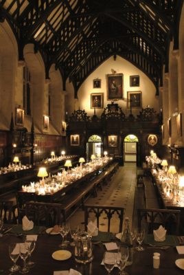 Inside the Dining Hall, tables set for dinner