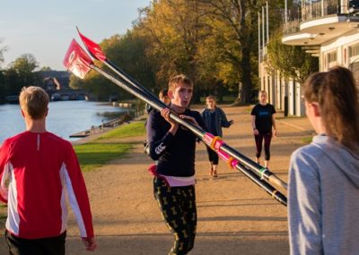 Rowing team by the river