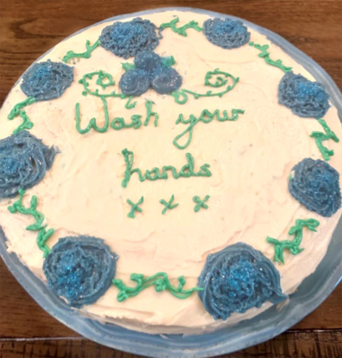 A home made cake advises people to Wash Your Hands
