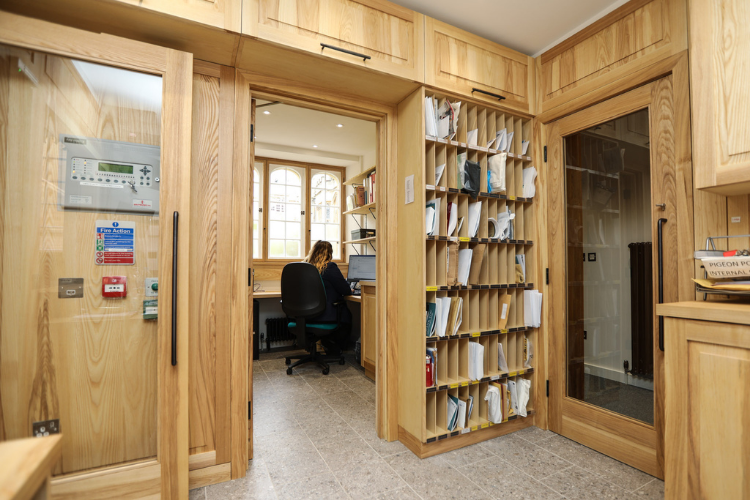 To the left of the new Lodge is a toilet and office with some pigeon holes