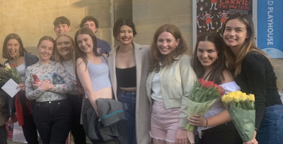 Exeter students queue outside the Playhouse