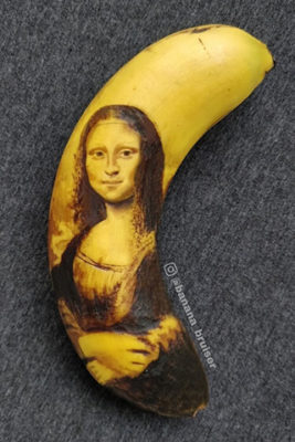 Banana with drawing of the Mona Lisa