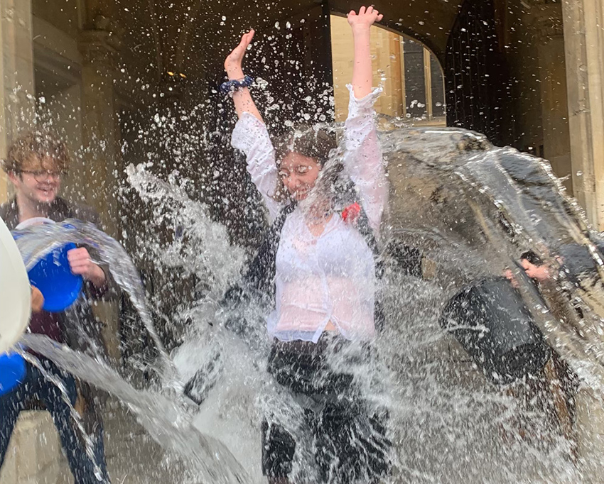 buckets of water thrown over a student