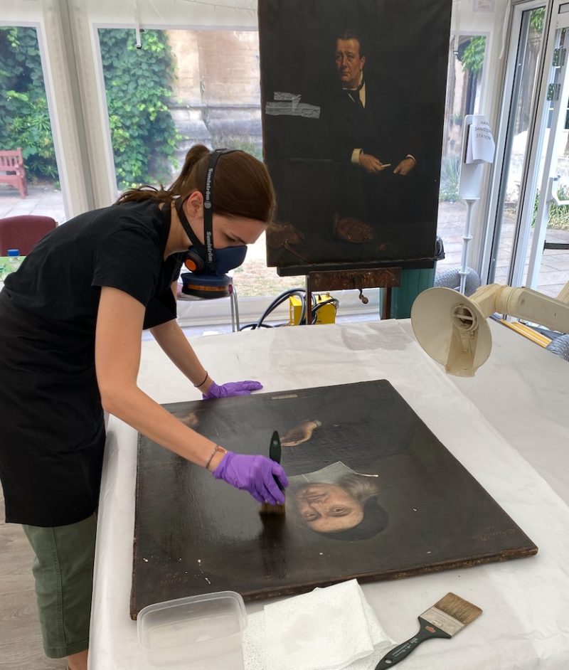 Elisabeth Subal applying an isolating varnish layer