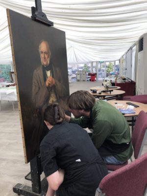 Sophia Boosalis and Jack Chauncy retouching the Portrait of Charles Lyell