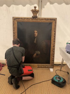 Cleaning the frame of the Portrait of Anthony Ashley Cooper