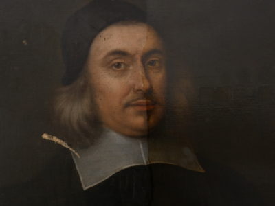 A visible light and ultraviolet light photograph of The Portrait of John Conant showing the varnish removal process