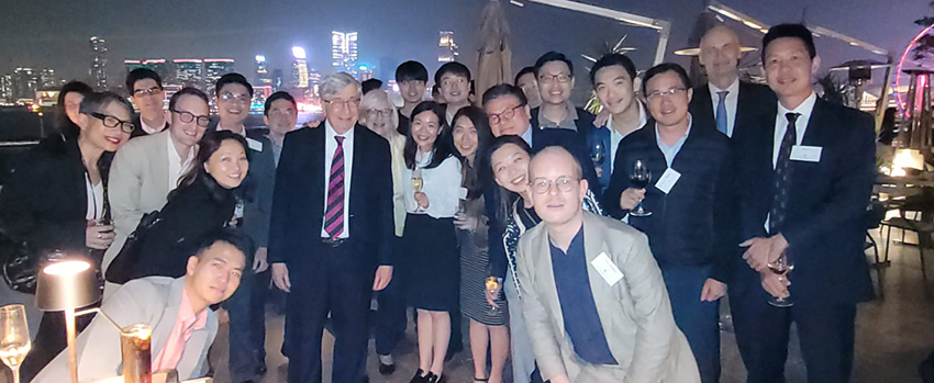 Rector Trainor and alumni in Hong Hong