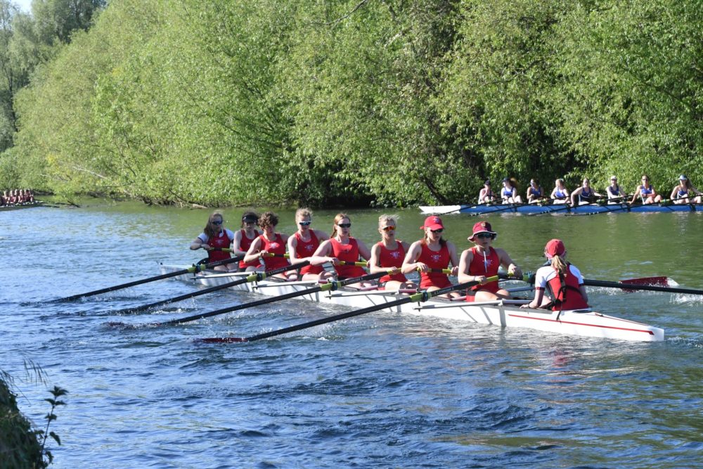 The W1 Team rowing on the water