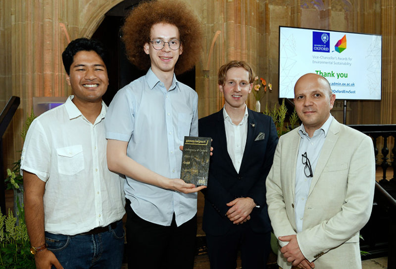 Exeter College students and staff accepting Gold Green Impact award