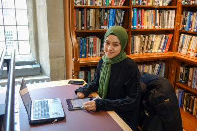 Student using refurbished Exeter College Library