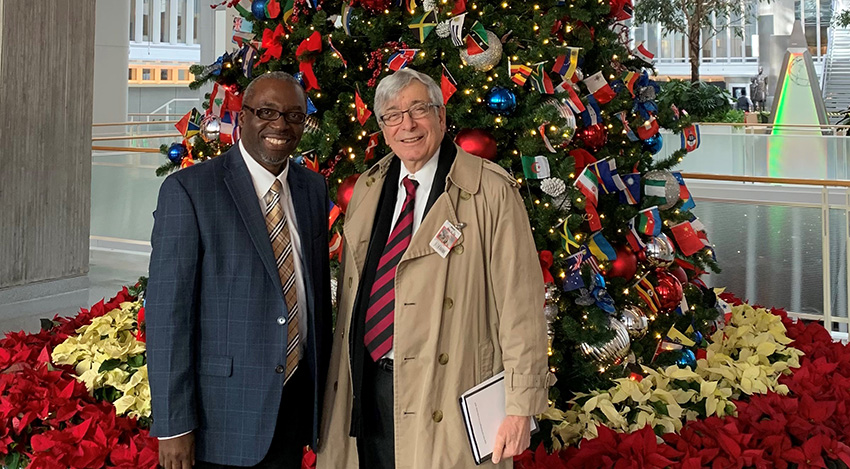 Rector Trainor and Kenneth Mwenda at the World Bank