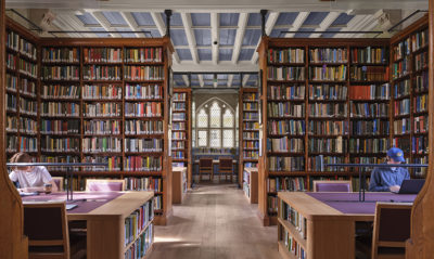 Library interior with Victorian bookcases