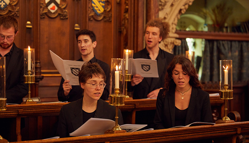 Members of Exeter College Choir singing in the Chapel