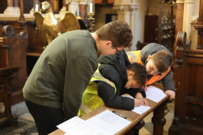 Max Port with students from John Henry Newman Primary School