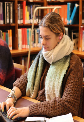 Student in the Jackson Library