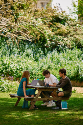 Students sitting in the Fellow's Garden